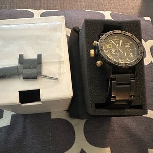 Nixon Black and Gold Watch